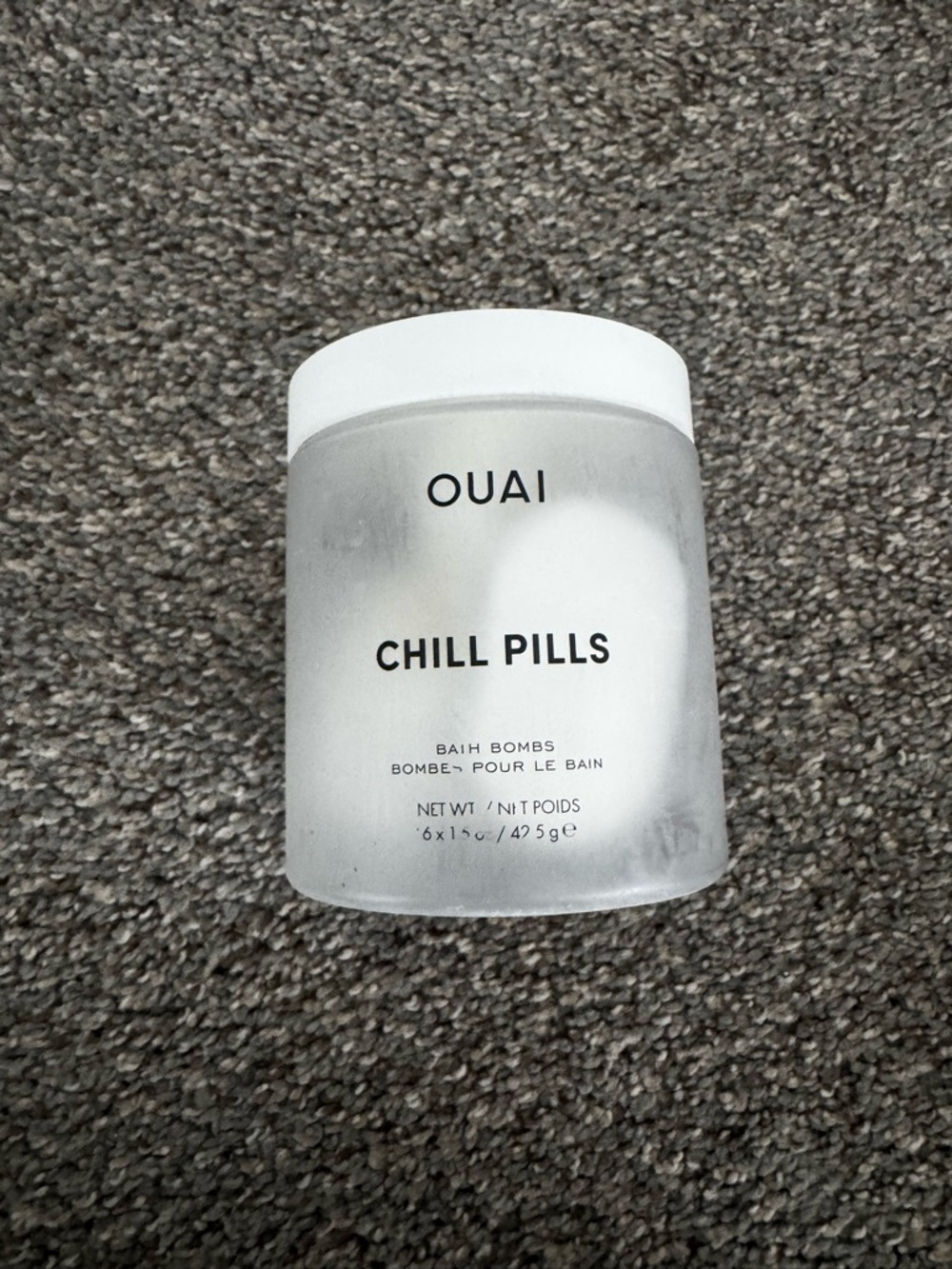 OUAI Chill Pills Bath Bombs - Frosted White Jar with Black Text
